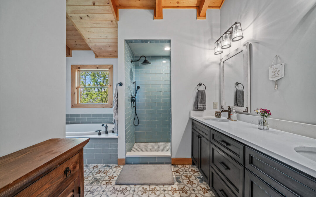 wood ceiling in master bath with walk in shower, soaker tub and double vanity